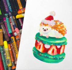 a drawing of a cupcake with a santa hat on it and crayons in the background