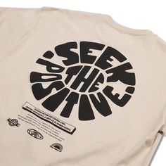 a t - shirt with the words see the sun printed on it, in black and white