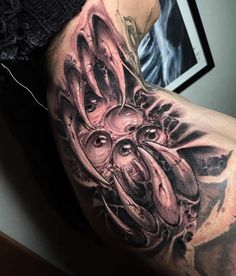 a man's arm with an octopus tattoo on it