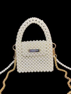 Explore our exquisite collection of handmade bags, featuring unique designs perfect for any occasion. Elevate your style with our elegant Women's Bag, ideal for weddings and special events. Our White Pearl Handbag is a luxurious accessory that adds a touch of sophistication to your ensemble. Whether you're a bride looking for the perfect bag or searching for a Valentine's Day gift, our range of trendy and carefully crafted bags ensures you stand out at any evening party. Embrace the allure of ou Luxury White Square Evening Bag, Luxury Bags With Pearl Top Handle, Luxury Bags With Pearl Handle And Top Handle, Luxury Pouch Bag With Pearl Handle, Luxury Top Handle Bag With Pearl Handle, Luxury Handheld Portable Box Bag, Luxury Portable Handheld Box Bag, Luxury Shoulder Bag With Pearl Handle, Luxury Tote Shoulder Bag With Pearl Handle