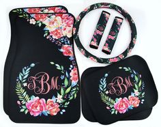 car mats with flowers and monogrammed initials are shown in the image, along with two matching steering wheel covers