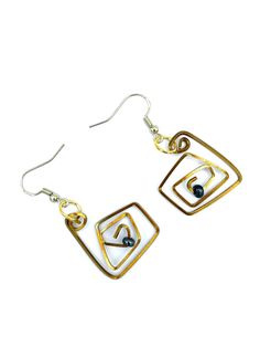 A pair of Earrings of Hand Formed square shape Brass Wire. A Freeform Geometric design, with a small shiny black round Glass Bead in the center. These lightweight Modern look Unique Earrings are hung on Fish Hooks of Gold Plated 925 Silver. Gold Spiral Earrings Made Of Copper, Gold Copper Wire Earrings As Gift, Wire Wrap Drop Earrings, Gold Copper Wire Earrings For Gift, Gold Wire Earrings For Pierced Ears, Hand Forged Spiral Metal Earrings, Gold Drop Earrings Made Of Copper Wire, Gold Wire Jewelry With Matching Earrings, Gold Freeform Earrings As Gift