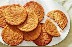 a white plate topped with cookies on top of a table