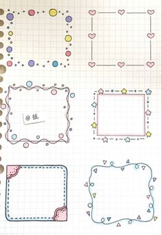 an open notebook with different shapes and lines on the pages, including squares, dots and hearts