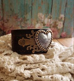 Silver & Bronze Heart Concho Black Leather Cuff Bracelet Leather Wristband. Heart Bracelet. Heart Jewelry. Romantic Jewelry. Love Heart - Etsy Vintage Adjustable Heart Bracelets, Vintage Adjustable Heart Bracelet For Valentine's Day, Vintage Leather Bracelet Gift, Vintage Leather Bracelet For Gift, Vintage Adjustable Heart Bracelet As Gift, Vintage Adjustable Heart Bracelet For Gift, Adjustable Vintage Heart Bracelet For Gift, Black Leather Cuff Bracelet, Glam Boho