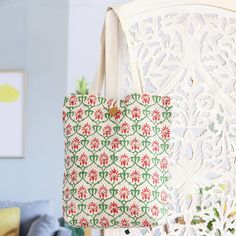 Indian artisans work with the traditional hand block print technique to create a lovely accessory for your everyday. Designed by artisans Krishna and Sharda, this cotton tote bag features handy straps and a mango wood button that ensures secure closure. The final touch is in the floral pattern in strawberry, green and ivory tones. Handwoven Shawls, Gift Suggestions, Indian Block Print, Indian Textiles, Red Strawberry, Hand Block Print, Final Touch, Cotton Tote Bag, Kids Prints