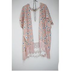 Spring Daisy Kimono Embroidered Floral Spring Summer Cover Up Bohemian spring daisy is reimagined in this kimono with boarder daisy embroidery  the midi-length hem. Wrap yourself in a dream as this light, cool fabric has a whisper of sheerness and a smooth, luxe feel. Traditional kimono styling features an open front, side slits, and wide elbow sleeves. Beachwear Kimono, Kimono Styling, Kimono Beach Cover Up, Kimono Women, Spring Daisy, Daisy Embroidery, Kimono Boho, Summer Cover Up, Pink Kimono