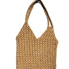 This bag is handcrafted using natural raffia yarn in a rich brown color and is perfect for beach trips, picnics and shopping. The versatility of the bag allows it to be used for a variety of activities, while the natural raffia material offers a lightweight yet durable design, making it ideal for everyday use.  The bag's intricate crochet technique combines elegance and functionality. Thanks to its large interior volume, you can easily carry all your needs. The brown tone complements any outfit, Intricate Crochet, Brown Tone, Beach Trips, August Birthstone Jewelry, July Birthstone Jewelry, Raffia Bag, Cloth Bag, Gifts For New Mums, Women Accessories Bags