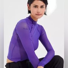 Dark Purple Out From Under Long Sleeve Sheer Mesh Mock Neck Top Never Worn Trendy Purple Long Sleeve Tops, Purple Long Sleeve Trendy Tops, Trendy Long Sleeve Purple Top, Fitted Purple Long Sleeve Tops, Fitted Long Sleeve Purple Top, Purple Stretch Crew Neck Top, Purple High Stretch Long Sleeve Top, Sporty High Neck Top For Spring, Sporty High Neck Tops For Spring