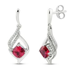 These gorgeous earrings for her feature cushion-cut lab-created rubies set in classic sterling silver. Swirls of round-cut white lab-created sapphires shimmer above to finish the look. The earrings secure with friction backs. Elegant Ruby Earrings With Diamond Accents, Wedding Earrings With Lab-created Ruby Gemstone, Elegant Diamond White Earrings With Birthstone, Elegant Diamond White Birthstone Earrings, Elegant Diamond Birthstone Earrings, Elegant White Gold Diamond Earrings With Birthstone, Formal Jewelry With Lab-created Ruby And Accent Stones, Elegant Gemstone Earrings With Lab-created Ruby, Elegant Formal Diamond Earrings With Birthstone