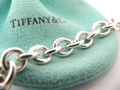 Offered for sale is a wonderful Tiffany and Co. Silver I Love You Heart Charm bracelet. The piece is made from substantial and bright Tiffany silver, and yet retains a very feminine feel to it. Attached to its very substantial Tiffany Silver charm bracelet is a fantastic and very pretty Tiffany & Co. Silver "I Love You" Heart charm. It is a classic Tiffany piece that will most certainly be a piece that you will be used over and over again, so it is great value for the money! It is a wonderfu Heart Padlocks, Silver Charm Bracelet, Tiffany And Co, Bracelet Bangle, Charm Gift, Tiffany Heart, Heart Bracelet, Heart Charm Bracelet, Tiffany & Co.