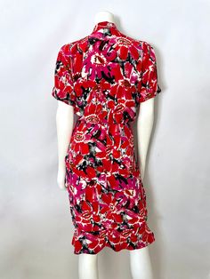 "Vintage Women's 80's St. Gillian, Red, Pink Floral, Short Sleeve, Silk Wrap Dress (S) This Ladies 1980's Dress comes in silk with a floral print in red, pink, brown and black with short, cuffed sleeves, with a wrap like front with a v neckline, a layered wrap skirt, front pleats and sits at the knee with a bottom loose ruffle trim. The fabric is soft, light weight and does not stretch. 100% Silk Made in Korea *This dress is in excellent condition. Size: (S) Modern Day Size 4 Bust: 34\" Waist: 2 Red Silk Midi Dress With Floral Print, Vintage Red Midi Dress For Spring, Red Rayon Midi Dress For Spring, Red Silk Dress With Printed Details, Red Printed Silk Dresses, Silk Red Printed Dress, Red Silk Dresses With Printed Details, Vintage Red Midi Dress With Floral Print, Red Floral Print Rayon Dresses