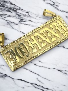 "●  10K 14K Solid Real Gold Customized Name Pendant Necklace in Frame Letter Diamond Cut Jewelry Personalized Gift For Him and Her   ●Necklace is not included, need to buy separately. ●Metal : 10K or 14K Solid Gold ●Purity : 10K or 14K with authenticity stamp ●Made in : United States ● Cut Type: Diamond Cut ●Shape :BLOCK or any customized shape as per your request. ● Fonts: Please specify fonts while placing your order, or we will do OLD ENGLISH fonts as shown in the image and video. ●Weight: Ap Customized Nameplate Jewelry For Personalized Gift, Custom Gold Jewelry For Personalized Gift, Custom Gold Nameplate Jewelry, Gold Polished Nameplate Necklace, Personalized Nameplate Jewelry With Polished Finish, Gold Nameplate Necklace Stamped 14k, Gold Polished Nameplate Jewelry, Custom Gold Necklace With Polished Finish For Anniversary, Gold Custom Necklace With Polished Finish For Anniversary