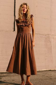 Effortlessly ethereal, this sweet midi from our free-est collection is the perfect romantic look. **Fit:** A-line silhouette with slim fit bodice **Features:** Exaggerated ruffled square neckline, billowy skirt design, tie-back closure **Why We | Ruffle It Up Midi Dress by free-est at Free People in Brown, Size: L Wild Fable Midi Dress, Feminine A-line Midi Dress With Ruffle Hem, Feminine Ruffled Tea-length Midi Dress, Tea Length Ruffled Midi Dress For Garden Party, Garden Party Tea Length Midi Dress With Ruffles, Garden Party Tea-length Ruffled Midi Dress, Chic Tea-length Dresses For Brunch, Chic Tea-length Maxi Dress For Garden Party, A-line Ruffled Midi Dress For Garden Party