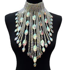 Level up your festival vibes with our Dazzling Crystal long irregular Tassel Necklace for Women. This stunning choker jewelry, bedecked with Shiny Glass Rhinestones, shimmers with a kaleidoscope of colors as you groove the night away. Crafted for both durability and flexibility, it's the ideal accessory to amp up your festival, concert, or special event style. Don't miss out on this mesmerizing festival must-have – grab yours today and dive into the festival magic! Rhinestone Statement Necklace, Choker Jewelry, Womens Chokers, Wedding Accessory, Party Necklace, Rhinestone Choker, Dress Belt, Glamorous Wedding, Rhinestone Wedding