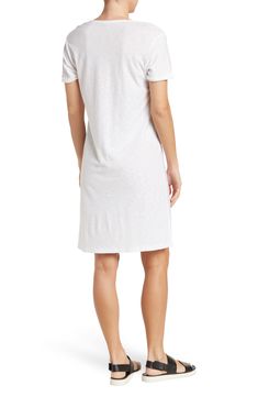 A stretchy rolled sleeve t-shirt dress is the perfect staple for classic, chic style. 36" length (size 2) Scoop neck Short sleeves Solid Stretch woven 51% cotton, 49% modal Machine wash cold, tumble dry low Imported Model stats: 5'10", 32" bust, 25" waist, 36" hip. Model is wearing size 2. Classic Chic Style, Classic Chic, T Shirt Dress, White Undershirt, Tshirt Dress, Nordstrom Rack, Chic Style, Scoop Neck, White Dress