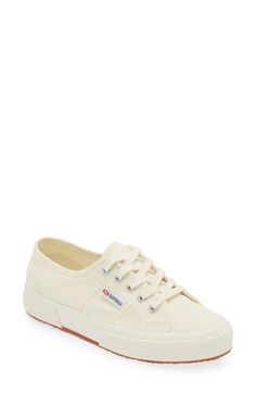 Bring tennis-inspired style to your wardrobe with this timeless Italian sneaker boasting a blank upper that welcomes doodles and DIY designs. Lace-up style Textile upper and lining/rubber sole Imported Italian Sneakers, Top Sneakers Women, Classic Sneakers, Up Styles, Diy Design, Womens Shoes Sneakers, Womens Sneakers, Top Sneakers, Shoes Sneakers