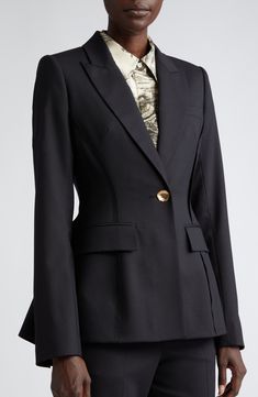 Gorgeous buttons that resemble molten gold add graceful elegance to this virgin-wool-blend blazer tailored in a fitted silhouette with a flared back. 27" front length; 28 1/2" back length (size 2) One-button closure Peaked lapels Four-button cuffs Chest welt pocket; front flap pockets Back vent 92% virgin wool, 6% polyamide, 2% elastane Dry clean Made in the USA Designer Clothing Designer Fitted Blazer For Office, Elegant Gold Blazer For Business, Gold Tailored Single Breasted Blazer, Elegant Tailored Gold Blazer, Gold Single-breasted Blazer For Evening, Gold Single Breasted Blazer For Evening, Designer Tailored Gold Blazer, Luxury Gold Blazer For Office, Gold Fitted Blazer With Suit Collar