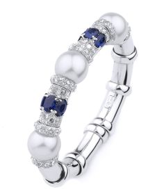 18K white gold Diamond Sapphire Pearl Bangle. RD=3.54ct.; Sapp=6.00ct.; Pearl=9mm Silver Multi-stone Diamond Bracelet, Fine Jewelry Silver Diamond Bracelet With Multi-stones, Elegant Diamond Bangle With Gemstones, Elegant Sapphire Diamond Bracelet With Brilliant Cut, Elegant Multi-stone Bangle For Anniversary, Luxury White Gold Multi-stone Bracelets, Elegant White Gold Sapphire Diamond Bracelet, Elegant Diamond Multi-stone Bracelets, Elegant Multi-stone Diamond Bracelet