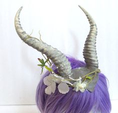 "This is only one of several new items coming to the store. There are others in development, so if you don't see what you are looking for, please keep checking back and if you need that something extra, then custom order requests are always welcome. Finish off any elvish costume with this beautiful gazelle horned crown. THE FLORAL BRANCH IS NOT INCLUDED it just gives you an idea of how it can be embellished adding a bit of whimsy to the crown, you may use wire or low temp hot glue for permanent Adjustable Horned Fantasy Headpiece, Elvish Crown, Gazelle Horns, Floral Branch, Costume Hats, Hot Glue, Larp, Just Giving, The Crown