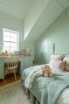 a bed room with a neatly made bed and a teddy bear sitting on the bed