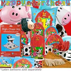 a birthday party set up with farm animals and cow balloons, plates, napkins