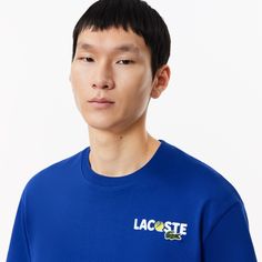 Show your love of tennis with this bold tee, featuring an iconic ball design. Made from a heavy jersey fabric with an eye-catching print on the back. For extra style points. Lacoste Sport, Ball Design, Lacoste Men, Us Man, 2024 Collection, Men's Collection, Jersey Fabric, Women Collection, Bleu Marine