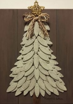 a white christmas tree made out of wooden planks