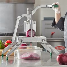 a person standing in a kitchen preparing food