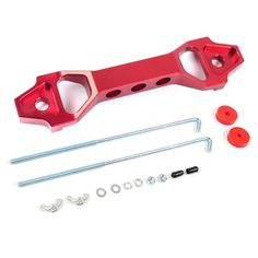 an image of a red aluminum handlebar with screws and nuts