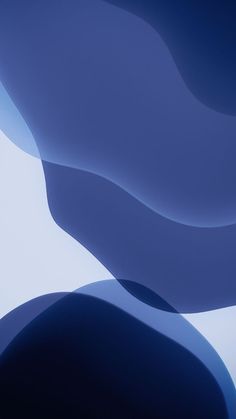 an abstract blue and white background with curved curves in the foreground, to be used as a wallpaper or backdrop