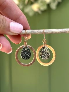 These beautiful hammered copper dangle earrings are eye-catching and sparkly. A pressed artisan pewter teardrop hangs in the center. They measure 1 inch in diameter and hang 1.5 inches from the ear. Copper, just like a penny, will oxidize (darken) to your own unique shade based on your body’s chemistry, air, oils, lotions, perfumes etc. While some like to keep their jewelry’s unique patina, it is very easy to restore the copper shine. Simply make a small paste of equal parts salt and white vineg Bronze Teardrop Metal Jewelry, Artisan Bronze Teardrop Jewelry, Hammered Bronze Teardrop Earrings, Bronze Hammered Teardrop Earrings, Copper Teardrop Jewelry Gift, Nickel-free Bronze Teardrop Earrings, Hammered Rose Gold Copper Jewelry, Teardrop Copper Jewelry For Gifts, Copper Teardrop Jewelry For Gift