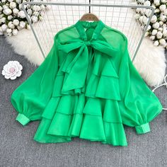 Spring Party Tops With Ribbon, Chic Chiffon Tie Neck Tops, Trendy Chiffon Blouse With Ruffles, Summer Party Top With Bow Tie, Green Chiffon Blouse For Summer, Spring Green Chiffon Blouse, Trendy Fitted Blouse With Bow, Trendy Fitted Blouse With Bow Detail, Spring Party Top With Bow Tie