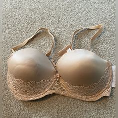 New With Tags. Adjustable Bra Can Be Worn With Straps In A Variety Of Ways (Single Shoulder, Both Shoulders, Cross Backed, Etc.) Or Be Worn Strapless. This Push-Up Bra Has An Adjustable Three-Hook Closure And Cute Lace Accents. Nude Coloring Makes It A Staple For Wedding Season, Summer Styles, And Basically All Year Round. Size 36d. Auden Brand By Target. Materials: See Tag Photo For Specifics, But Nylon, Spandex And Polyester. Smoke-Free, Pet-Free Home. Cream Push-up Bra With Built-in Support, Beige Push-up Bra With Lined Body, Elegant Beige Bra With Lined Body, Elegant Lined Beige Bra, Elegant Beige Lined Bra, Purple Bralette, Push Up Strapless Bra, Pumping Bras, Pink Lace Bra