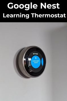 a thermostaer is mounted to a wall with google nest learning thermostat on it