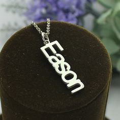 Personalized Vertical Nameplate Necklace Sterling Silver Silver Anniversary Name Necklace, Silver Engraved Metal Name Necklace, Personalized Silver Metal Necklace, Custom Name Silver Necklaces, Silver Engraved Name Necklace, Custom Name Silver Jewelry In Stainless Steel, Silver Stainless Steel Name Necklace Pendant, Personalized Stainless Steel White Gold Necklace, Customized Sterling Silver Jewelry In Silver Color