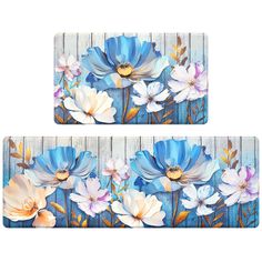 two blue and white flowers painted on wooden planks