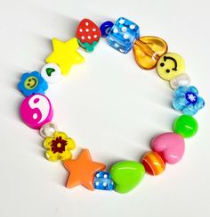 A beautiful handbeaded kidcore bracelet using a variety of different beads to make a gorgeous bracelet. Kidcore Bracelet, Funky Bracelet, Kidcore Aesthetic, Cute Birthday Gift, Kandi Bracelets, Photo Stickers, Kid Core, Rainbow Items, Gorgeous Bracelet