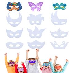 children wearing masks with their hands in the air