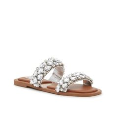 Steve Madden-Hazie Sandal Your whole outfit will shimmer when you step out in the Hazie sandals from Steve Madden. This sporty slide silhouette features a double strap design, embellished with oversized rhinestones decorated throughout. Silver Embellished Vacation Sandals, Silver Embellished Sandals For Vacation, Embellished Silver Sandals For Vacation, Spring Bedazzled Flat Sandals, Bedazzled Flat Sandals For Summer, Silver Sandals With Rhinestones For Summer, Summer Silver Sandals With Rhinestones, Silver Rhinestone Sandals For Summer, Summer Bling Sandals In Synthetic Material