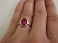 pink ruby ring::::Who can find a virtuous woman? for her price is far above rubies. Proverbs 31:10 (birthday present) Ruby Birthstone Ring In Round Cut, Lab-created Ruby Promise Ring With Round Band, Round Cut Ruby Ring For Promise, Round Cut Ruby Promise Ring, Oval Solitaire Ruby Ring, Red Ruby Round Band Jewelry, Sterling Silver Ruby Promise Ring, Ruby Birthstone Ring With Round Band, Solitaire Ruby Ring For Anniversary