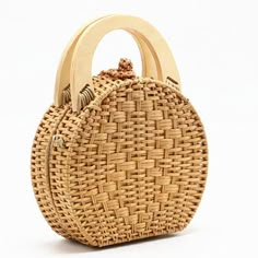 Luxury Straw Bag With Detachable Handle, Luxury Elegant Straw Bag With Detachable Handle, Luxury Beige Bag With Bamboo Handle, Elegant Luxury White Straw Bag, Luxury Trendy Straw Shoulder Bag, Luxury Braided Bags For Daily Use, Luxury Top Handle Straw Bag With Open Weave, Luxury Yellow Straw Bag For Everyday, Luxury Basket Shoulder Bag With Rolled Handles