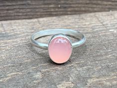 Soft Elegant Romantic Pink or Aqua Blue Oval Chalcedony Sterling Silver Ring | Pink Chalcedony Ring | Blue Chalcedony Ring | Solitaire Ring by GildedBug on Etsy Oval Pink Opal Gemstone Rings, Pink Oval Stackable Jewelry, Pink Oval Moonstone Ring In Sterling Silver, Pink Oval Opal Ring In Sterling Silver, Pink Oval Stackable Rings, Pink Oval Moonstone Ring, Pink Oval Cabochon Opal Ring, Pink Oval Opal Ring For Gift, Blue Chalcedony Ring