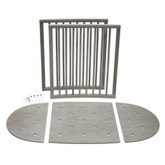 an image of a baby gate set up with the door and side panels cut out