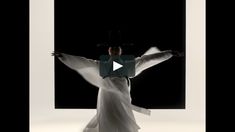 a woman in white is dancing with her arms outstretched