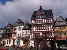 several buildings line the street in an old european town