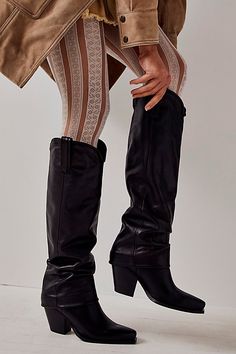 Saddle up with these sleek Western-inspired boots, featured in a tall style and slouchy design for an ultra-cool twist. **Features:** Tall style, pull-on design, Western-inspired silhouette, leather fabrication, pointed toe, slouchy ankle details, pull straps, block heel**Why We <3 It:** Wear these boots with some tights and a sleek mini for an ultra elevated look. Tall Tan Boots, Slouchy Ankle Boots, Free People Boots, Platform Chelsea Boots, Tall Brown Boots, Boho Boots, Black Boots Tall, White Boots, Boots Knee