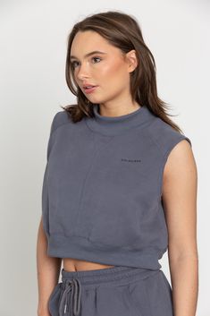 Our Slate GH Sweat Crop Top is so comfortable, it’s sure to become a staple in your weekly rotation. Featuring a cozy fleece lining and cropped waistband for the perfect fit, this top ensures comfort wherever your day takes you. Perfect for any layered outfit, but also versatile enough to be worn on its own. The thickness and fit of this top will leave you speechless. Layered Outfit, You Perfect, Tennis Skirts, Layering Outfits, Athletic Top, Yoga Tops, Model Height, Bra Tops, Fitness Models