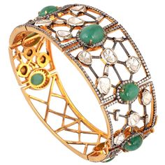 18KT Gold :3.170g Diamond:8.82ct SiIver:23.864g Emerald:11.39ct Size:48X58X30 MM 18k Gold Bangle, April Birthstone Jewelry, Bangle Silver, March Birthstone Jewelry, Forever Jewelry, Handmade Bangles, Zodiac Jewelry, Moissanite Jewelry, Uncut Diamond