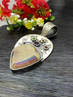 "ARTISAN RAINBOW DRUZY PENDANT Hand-made Sterling Silver 925. Stones used: Rainbow Druzy, Pink Tourmaline, Citrine, Green Sapphire, Garnet, Amethyst.. Height -2 9/16\" (including bail), Width - 1 1/16\" Height - 65mm (including bail), Width - 34mm Unique Handcrafted One-of a-kind Design Pendant Each Piece of Jewelry in my Collection is Absolutely One of a Kind! When you start wearing a piece of my jewelry you will fall in love with it more and more each day and feel that good Energy and Love tha Multicolor Gemstones With Stone Setting As Gift, Multicolor Gemstones With Stone Setting For Gifts, Multicolor Gemstones For Gifts With Stone Setting, Multicolor Gemstones Gift With Stone Setting, Handmade Sterling Silver Gemstones For Anniversary, Unique Sterling Silver Gemstones For Gifts, Handmade Silver Gemstones For Jewelry Making, Handmade Pendant Jewelry For Birthday, Silver Bohemian Jewelry For Birthdays